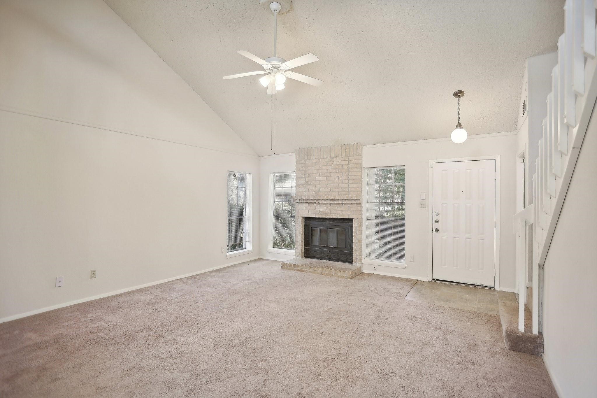 24203 Landing Way Drive Spring, TX 77373 - Photo 1 of 16 an empty room with a fireplace