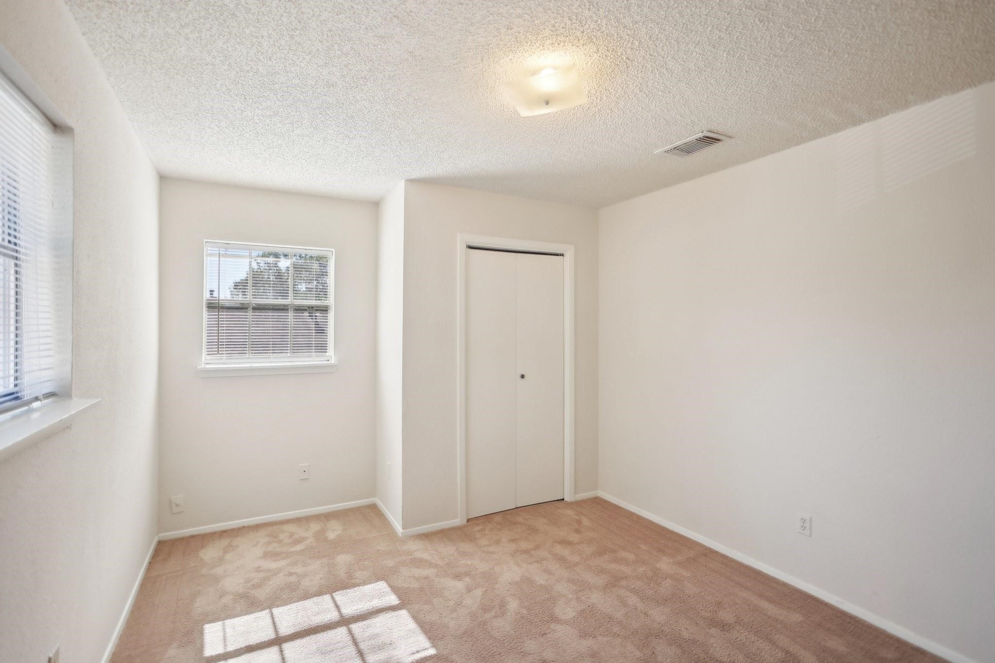 24203 Landing Way Drive Spring, TX 77373 - Photo 11 of 16 a view of an empty room with a window