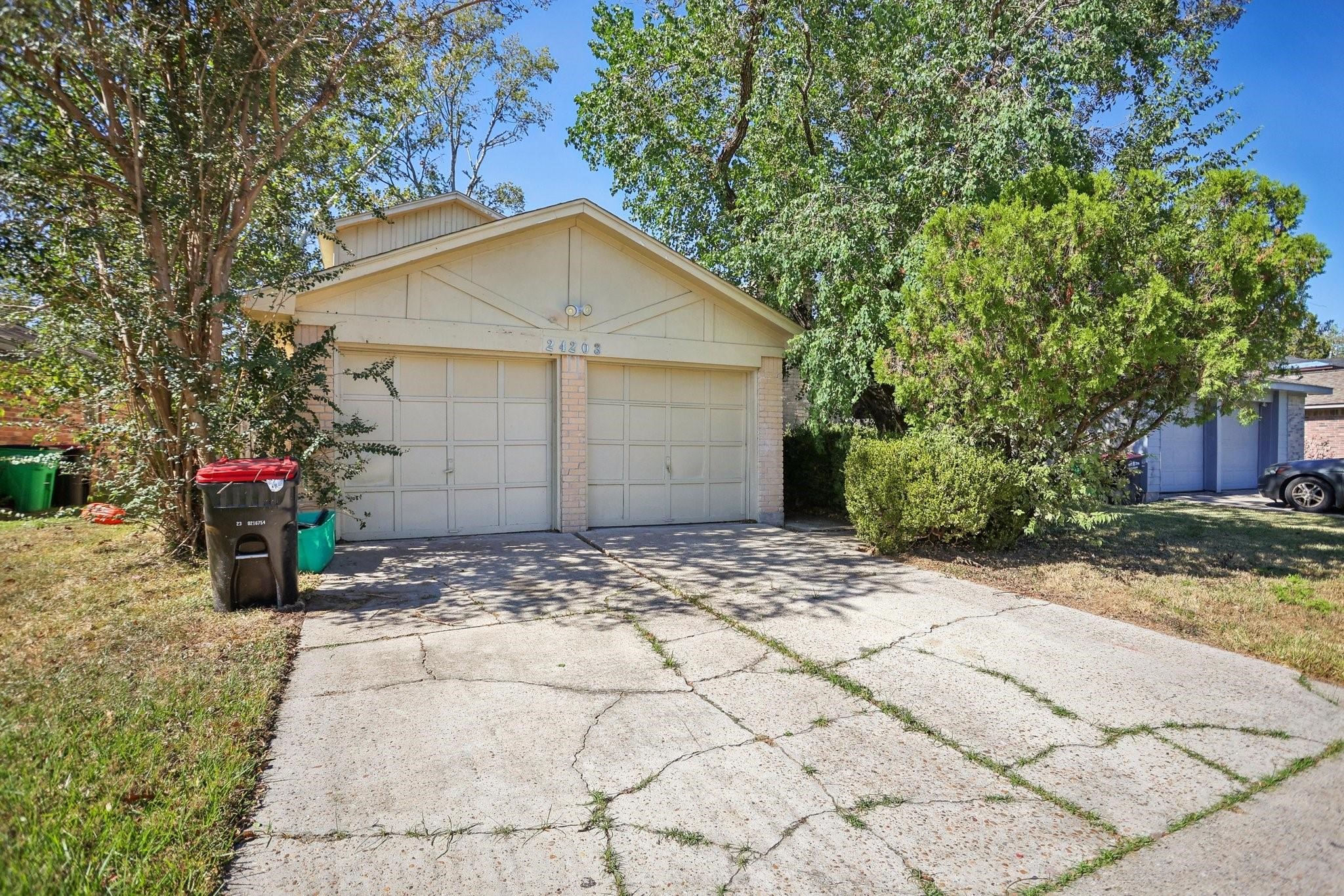24203 Landing Way Drive Spring, TX 77373 - Photo 16 of 16 a view of a house with a patio