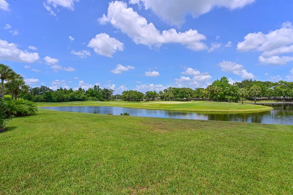 10622 Conch Shell Terrace Bradenton, FL 34212 - Photo 48 of 69 a view of a lake with houses in the back