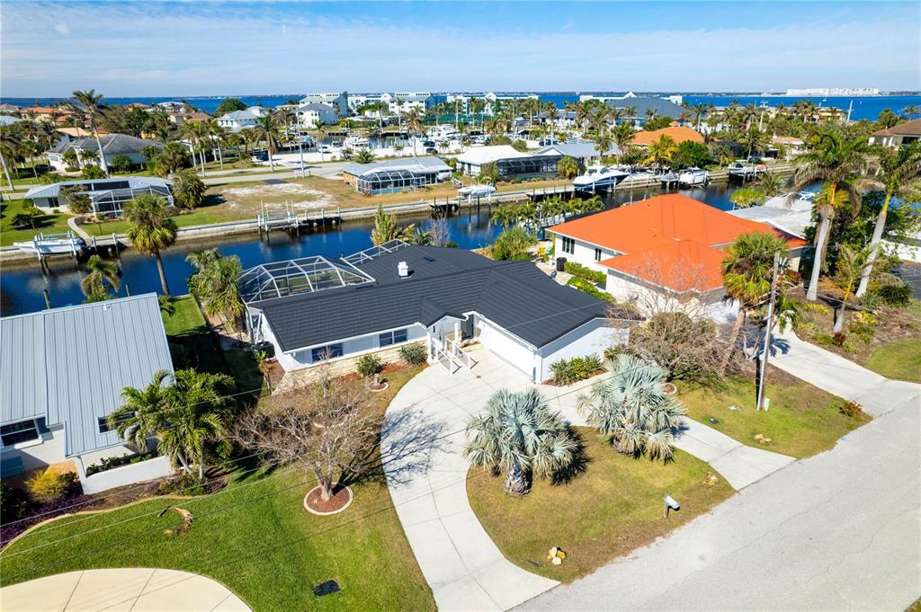 1732 Boca Raton Court Punta Gorda, FL 33950 - Photo 2 of 64 an aerial view of a house with a swimming pool yard and outdoor seating