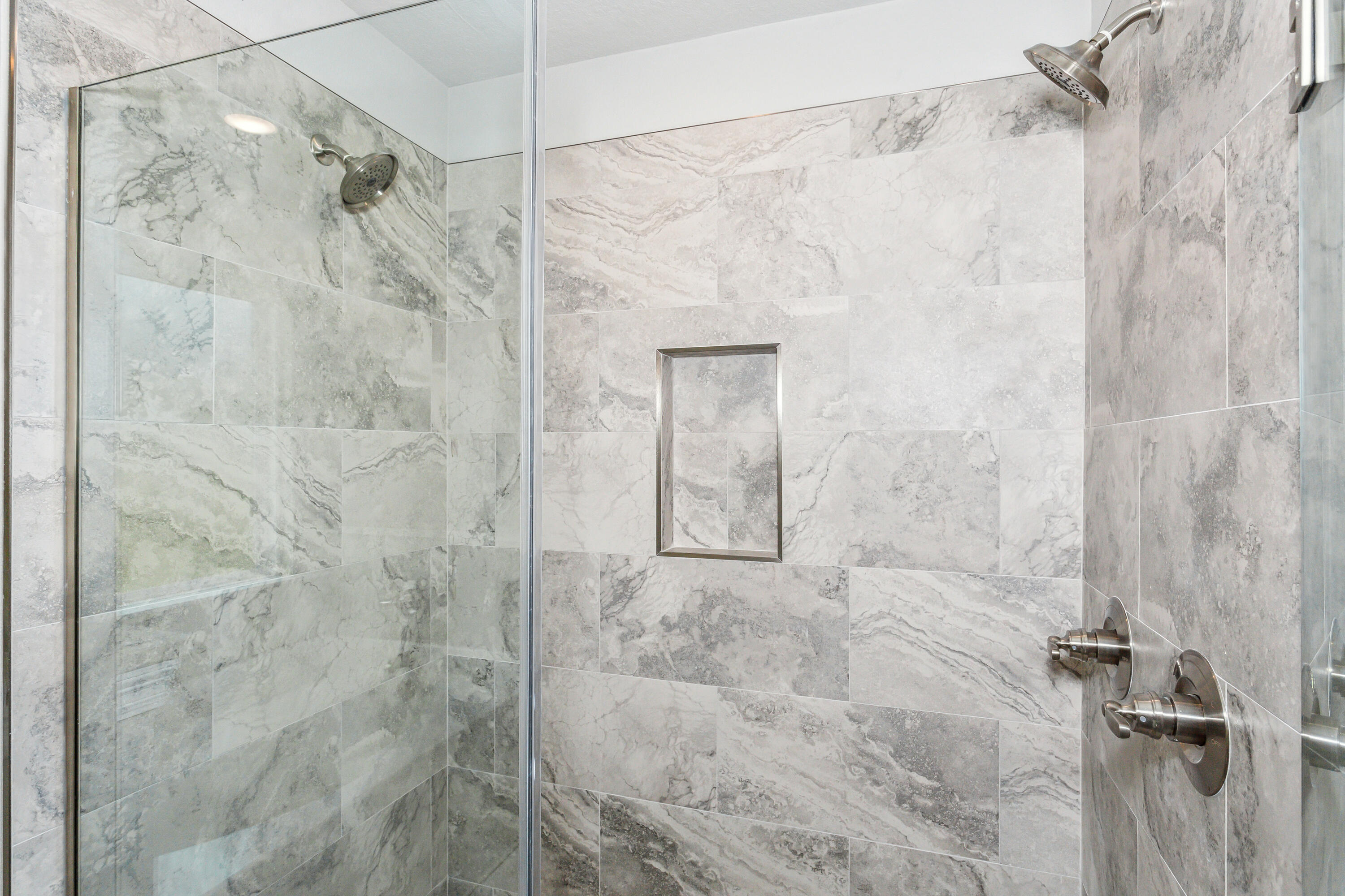 8721 Valhalla Drive Milton, FL 32583 - Photo 28 of 48 a bathroom with a shower