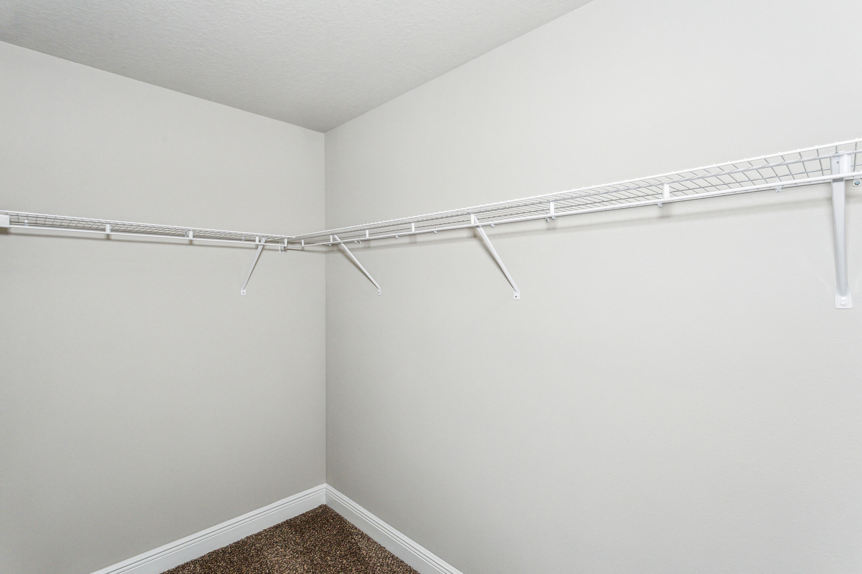 8721 Valhalla Drive Milton, FL 32583 - Photo 29 of 48 a view of a room with racks on the wall