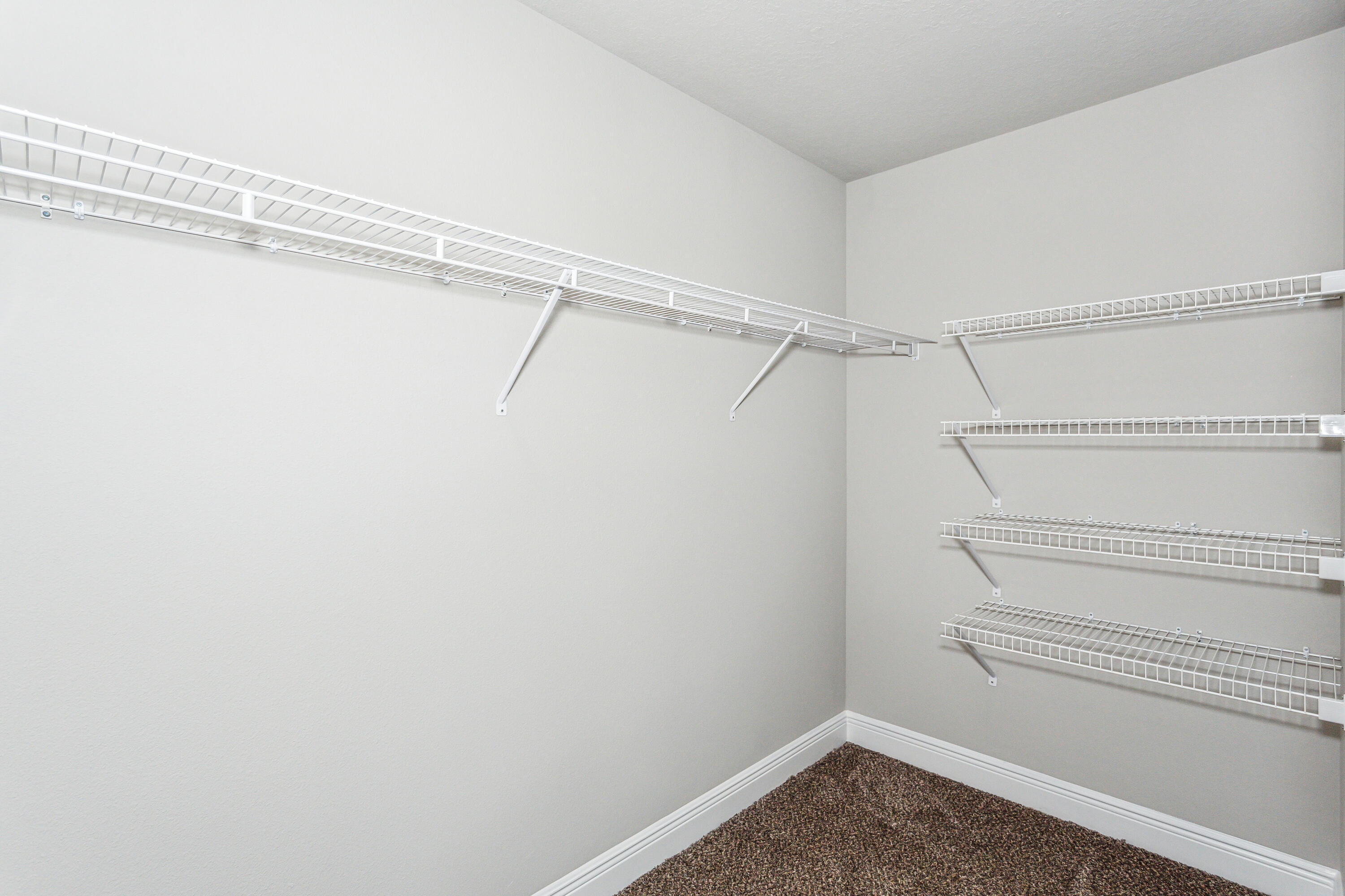 8721 Valhalla Drive Milton, FL 32583 - Photo 30 of 48 a view of an empty walk in closet