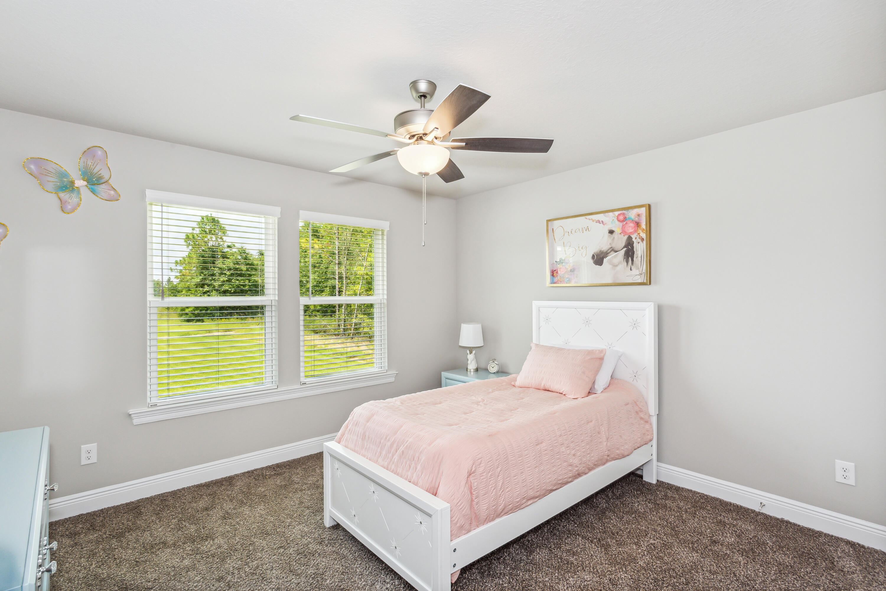 8721 Valhalla Drive Milton, FL 32583 - Photo 35 of 48 a bedroom with a bed and a window