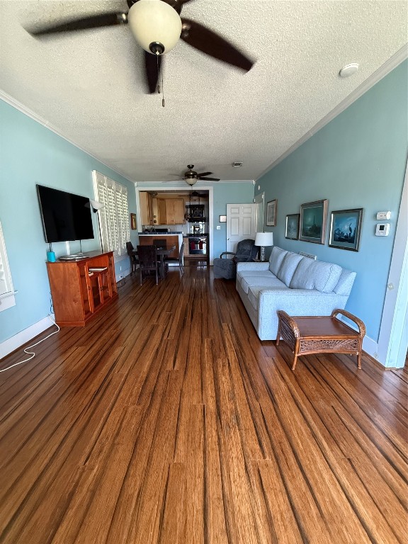 4416 Avenue R Galveston, TX 77550 - Photo 2 of 11 a living room with furniture and a flat screen tv