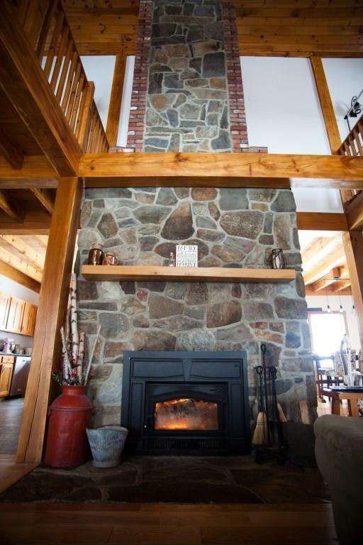 92 Lyle Hall Road Wilton, ME 04294 - Photo 6 of 35 Centrally located wood burning fireplace
