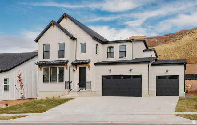 1595 West Canyon Rim Road, Unit 630 Lehi, UT 84048 - Photo 4 of 22 Previously Built Eden Modern Farmhouse illustrating finished look.