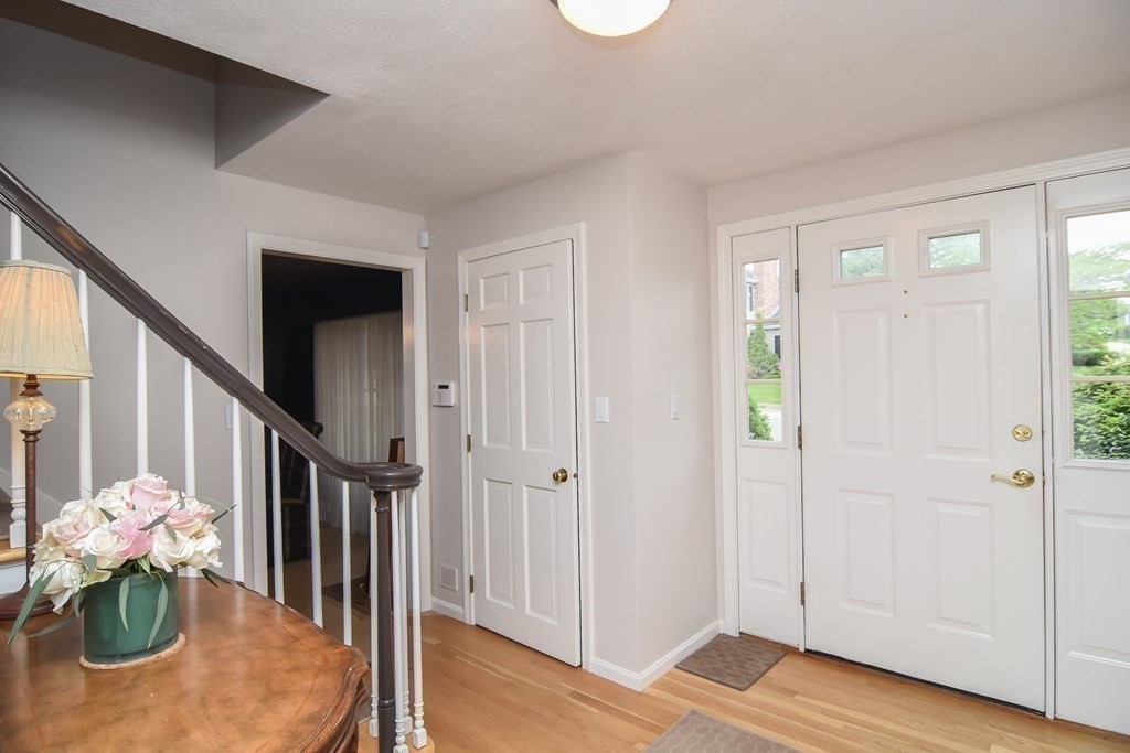 73 Cynthia Road Needham, MA 02494 - Photo 15 of 41 a view of entryway with wooden floor