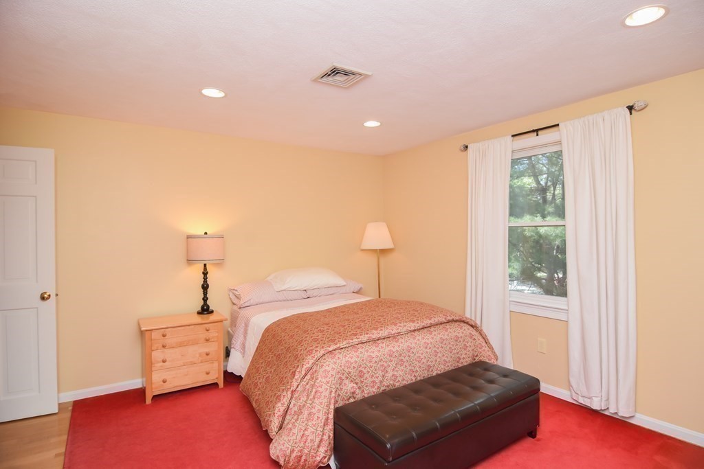 73 Cynthia Road Needham, MA 02494 - Photo 27 of 41 a bed room with a bed and a window