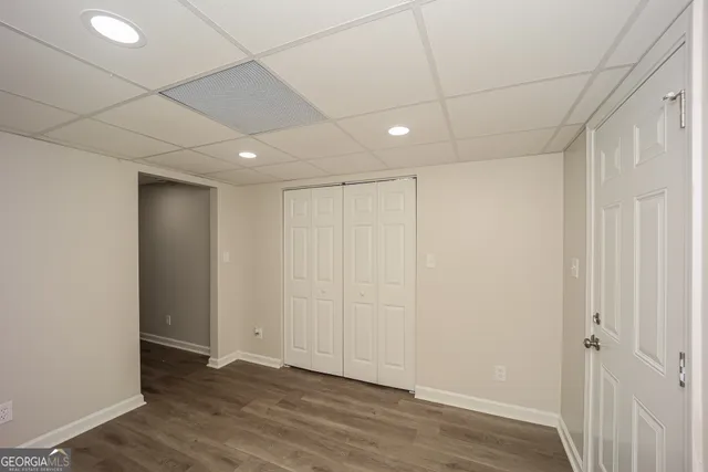 a view of entryway with wooden floor