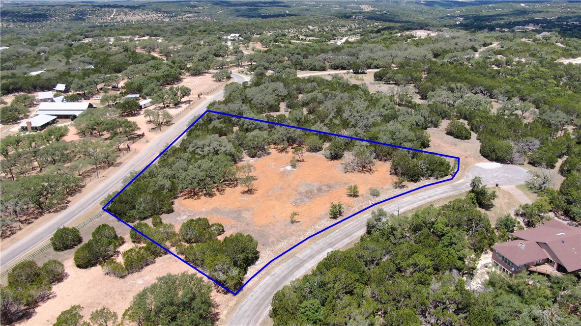 0 Stonegate Lane Dripping Springs, TX 78620 - Photo 1 of 1 a view of a forest from a balcony