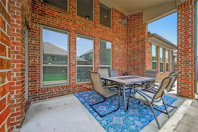 a view of a outdoor seating area with furniture