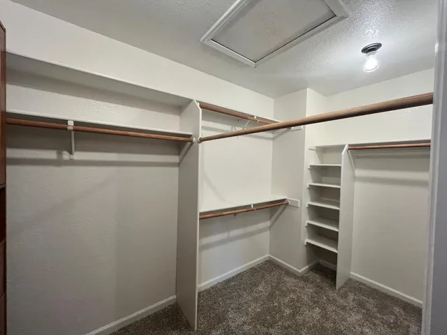 a bathroom with a sink vanity and a mirror