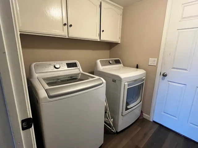 a utility room with dryer and washer