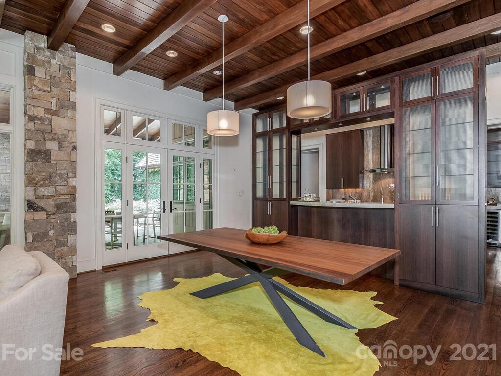 8424 Eagle Glen Charlotte, NC 28210 - Photo 17 of 48 a living room with stainless steel appliances granite countertop lots of furniture and a kitchen view