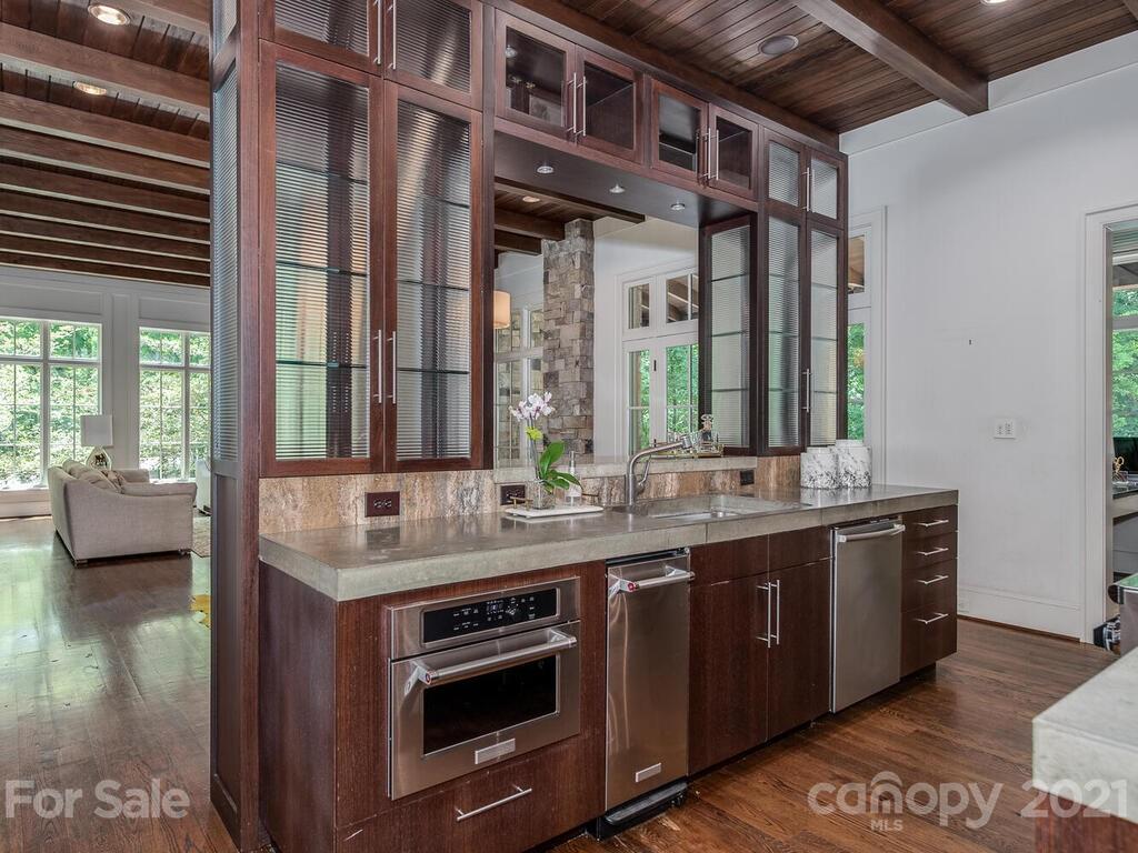 8424 Eagle Glen Charlotte, NC 28210 - Photo 19 of 48 a view of a double vanity sink and a window