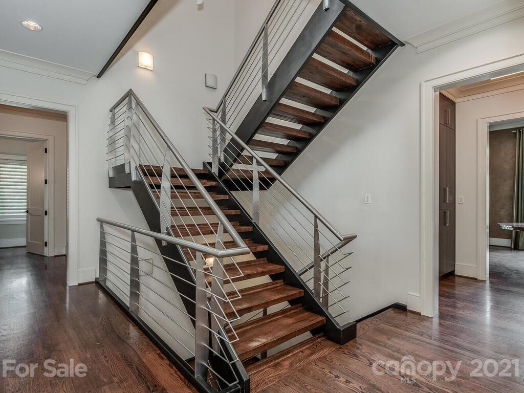 8424 Eagle Glen Charlotte, NC 28210 - Photo 2 of 48 a view of entryway and hall with wooden floor