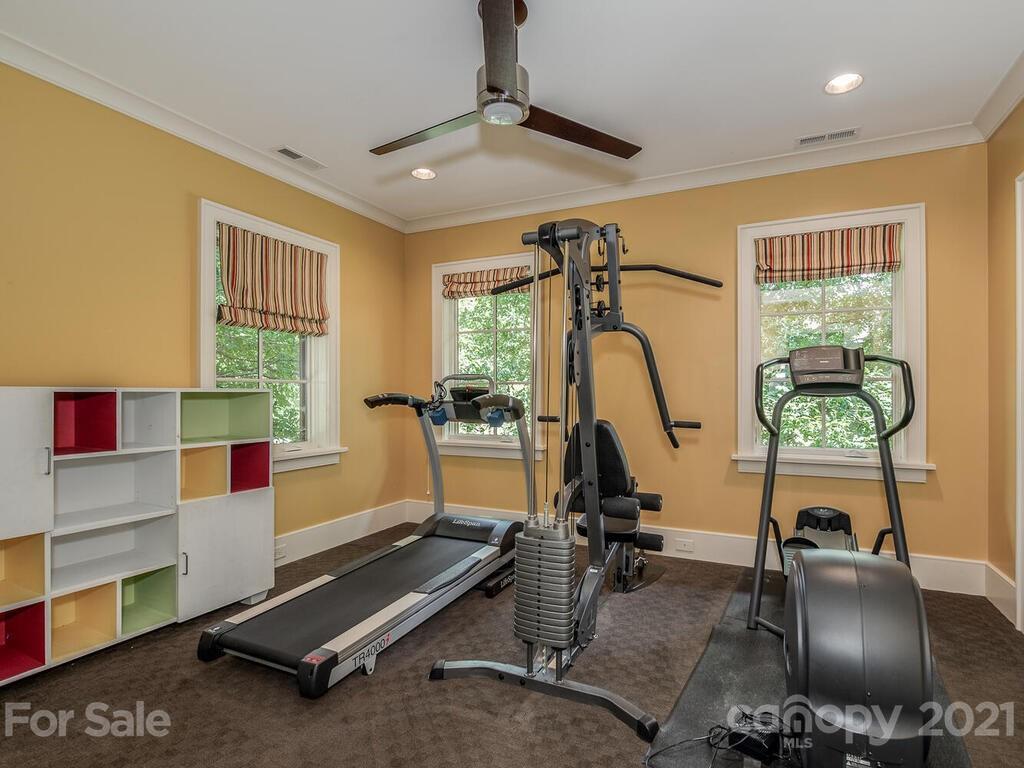 8424 Eagle Glen Charlotte, NC 28210 - Photo 33 of 48 a view of a room with gym equipment