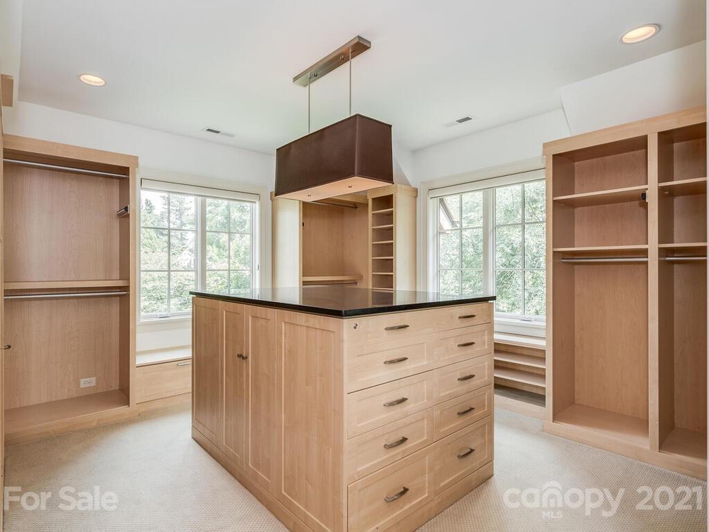 8424 Eagle Glen Charlotte, NC 28210 - Photo 40 of 48 a view of a dresser and a window