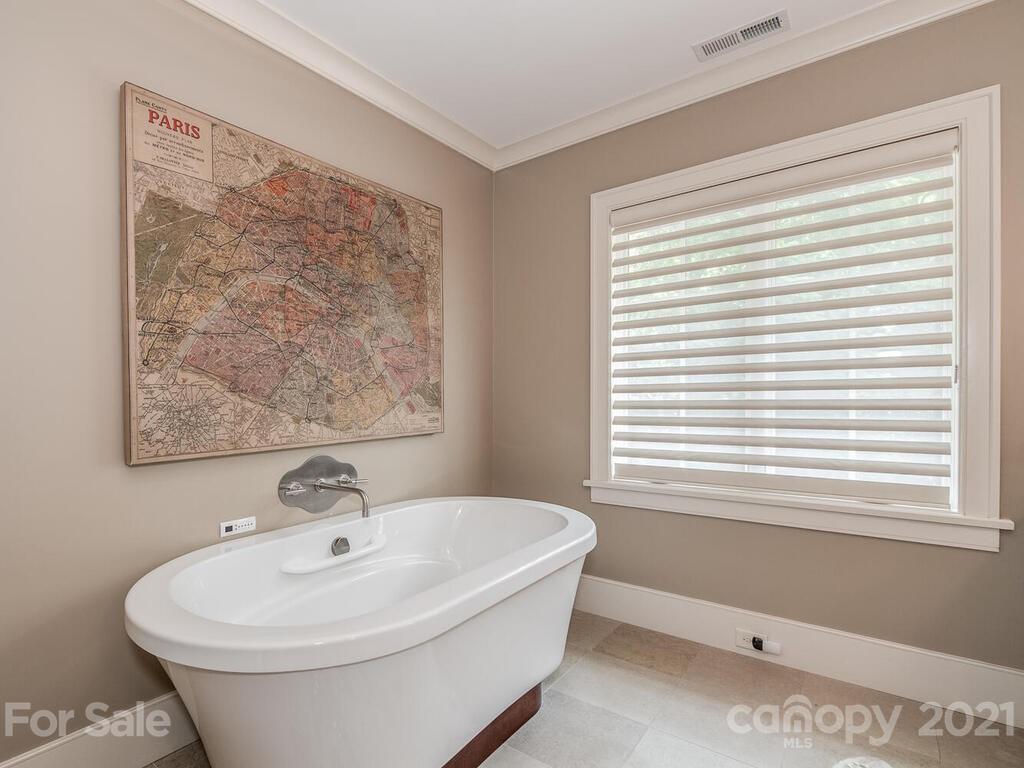 8424 Eagle Glen Charlotte, NC 28210 - Photo 42 of 48 a bathroom with a sink and a window