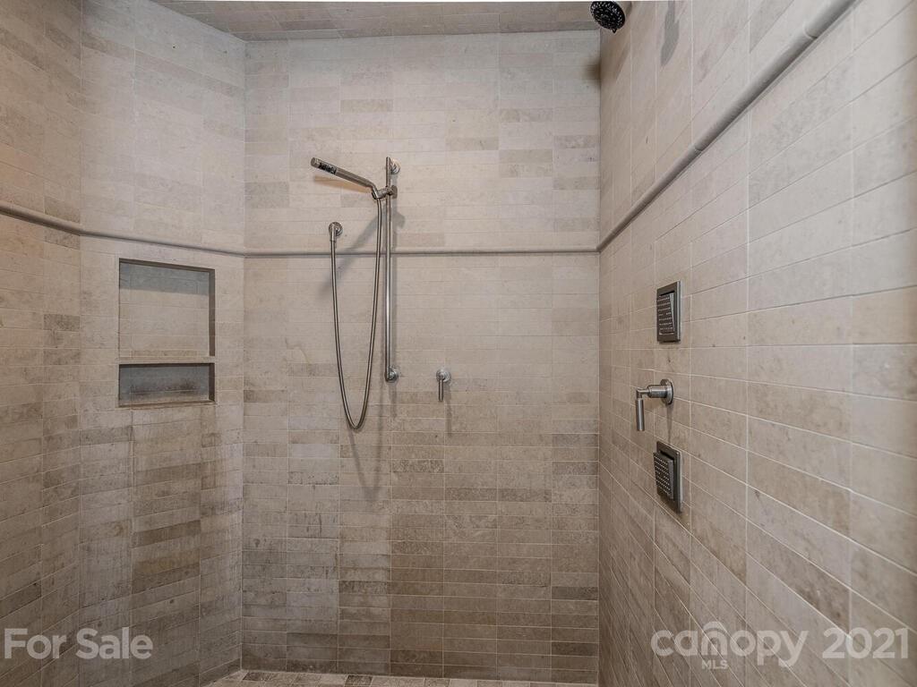 8424 Eagle Glen Charlotte, NC 28210 - Photo 43 of 48 a bathroom with a shower