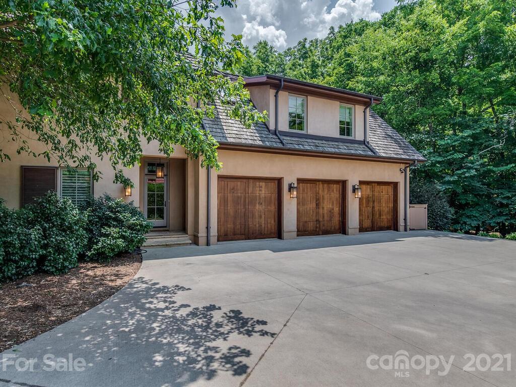 8424 Eagle Glen Charlotte, NC 28210 - Photo 7 of 48 a front view of a house with a garden