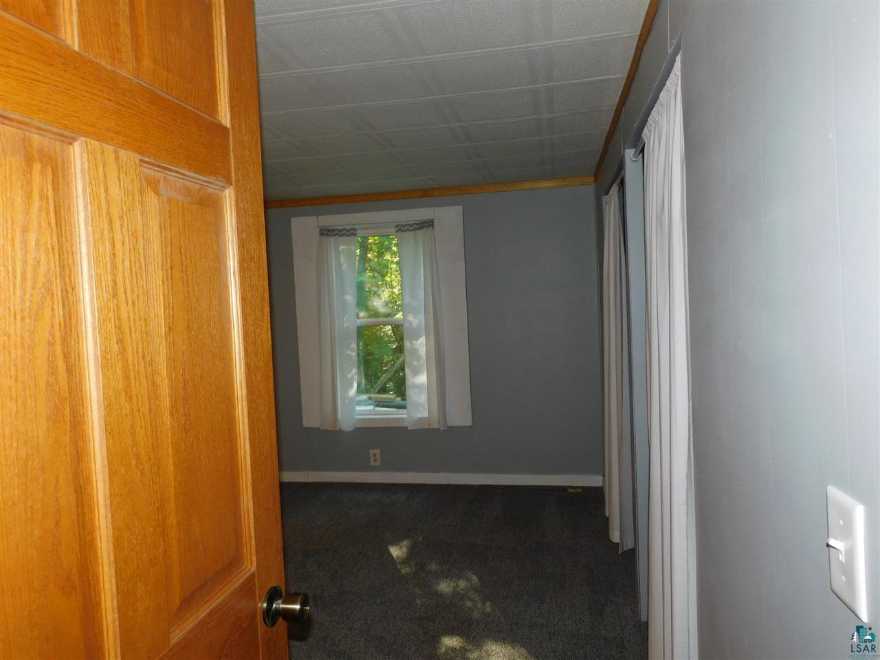 6228 County Rd P Hawthorne, WI 54864 - Photo 23 of 49 Solid door entry Bedroom 2
