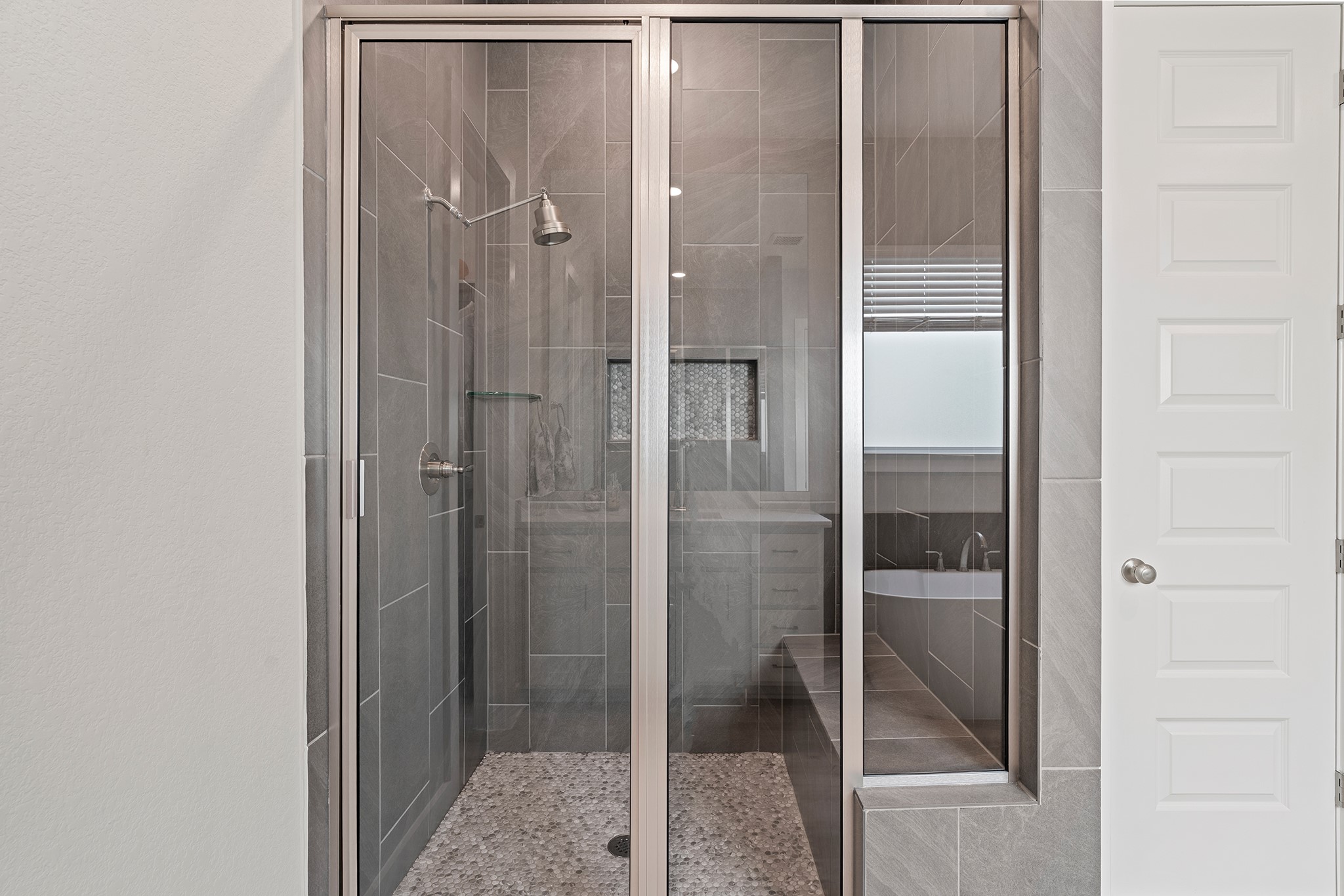 2112 Tobiano Trace Georgetown, TX 78633 - Photo 19 of 40 a bathroom with a glass shower door