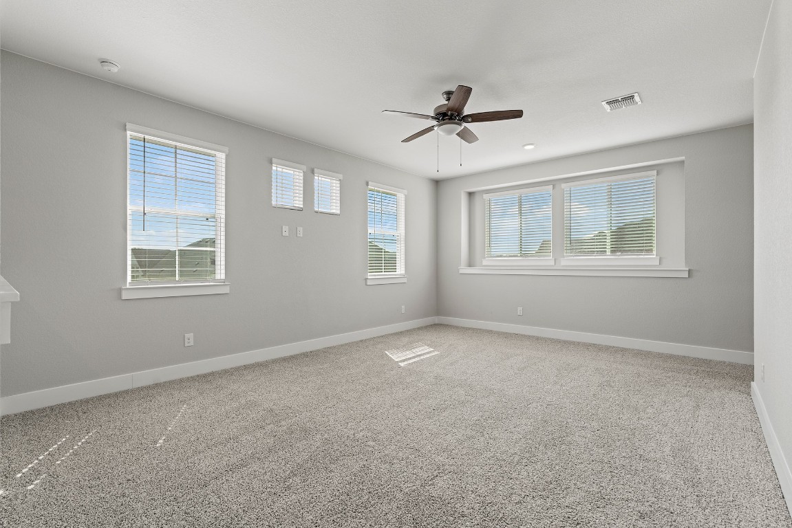 2112 Tobiano Trace Georgetown, TX 78633 - Photo 31 of 40 a view of an empty room with a window