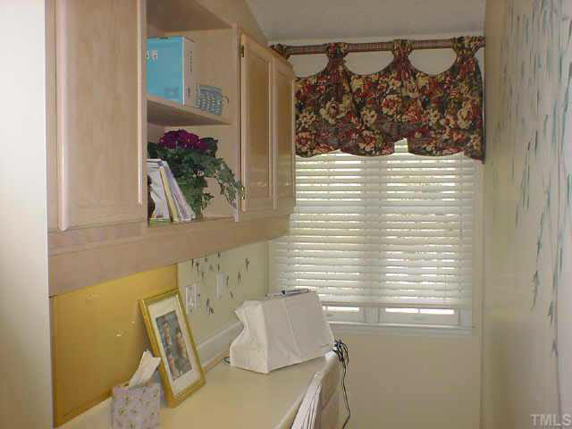 8801 Attingham Drive Raleigh, NC 27615 - Photo 8 of 10 Studay area on the second floor, built in desk, great for homework station, computer station