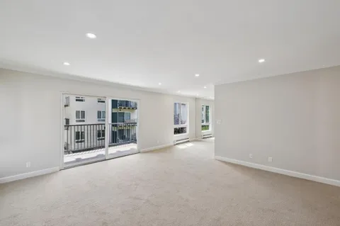 wooden floor in an empty room with a fireplace