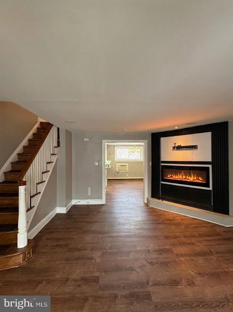 210 Wabash Avenue Lansdowne, PA 19050 - Photo 2 of 12 a view of an empty room with window and fireplace