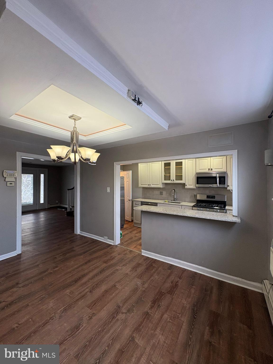 210 Wabash Avenue Lansdowne, PA 19050 - Photo 4 of 12 a kitchen with stainless steel appliances granite countertop a stove and cabinets