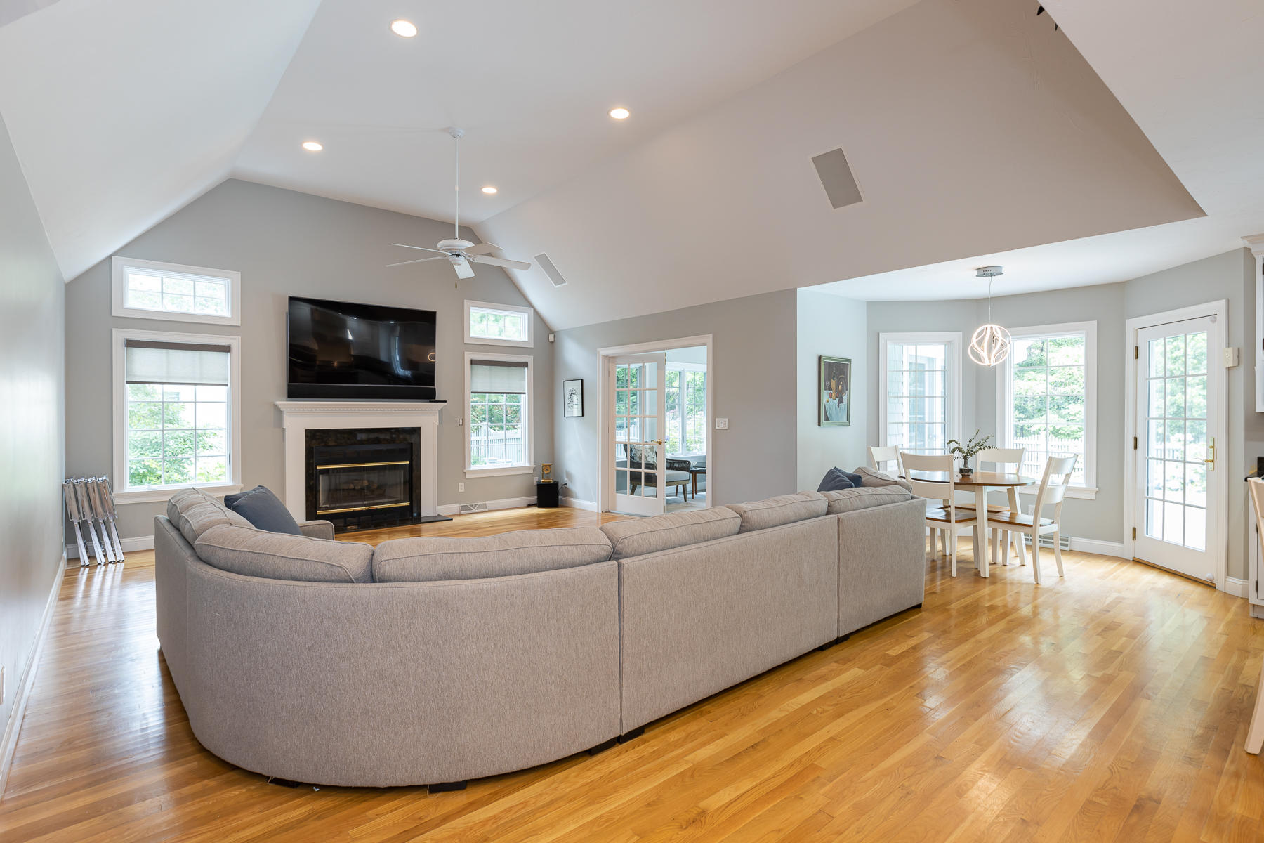 36 Topping Lift Mashpee, MA 02649 - Photo 13 of 38 a living room with fireplace furniture and a flat screen tv