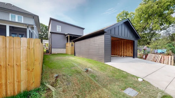 a view of backyard of house