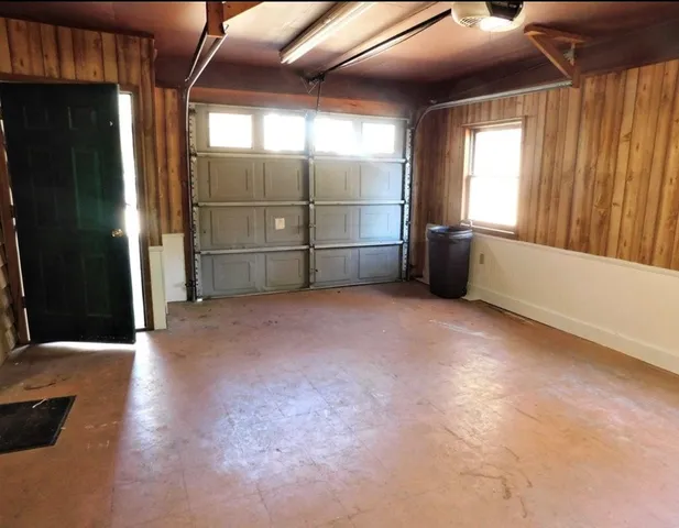 a view of a backyard of the house