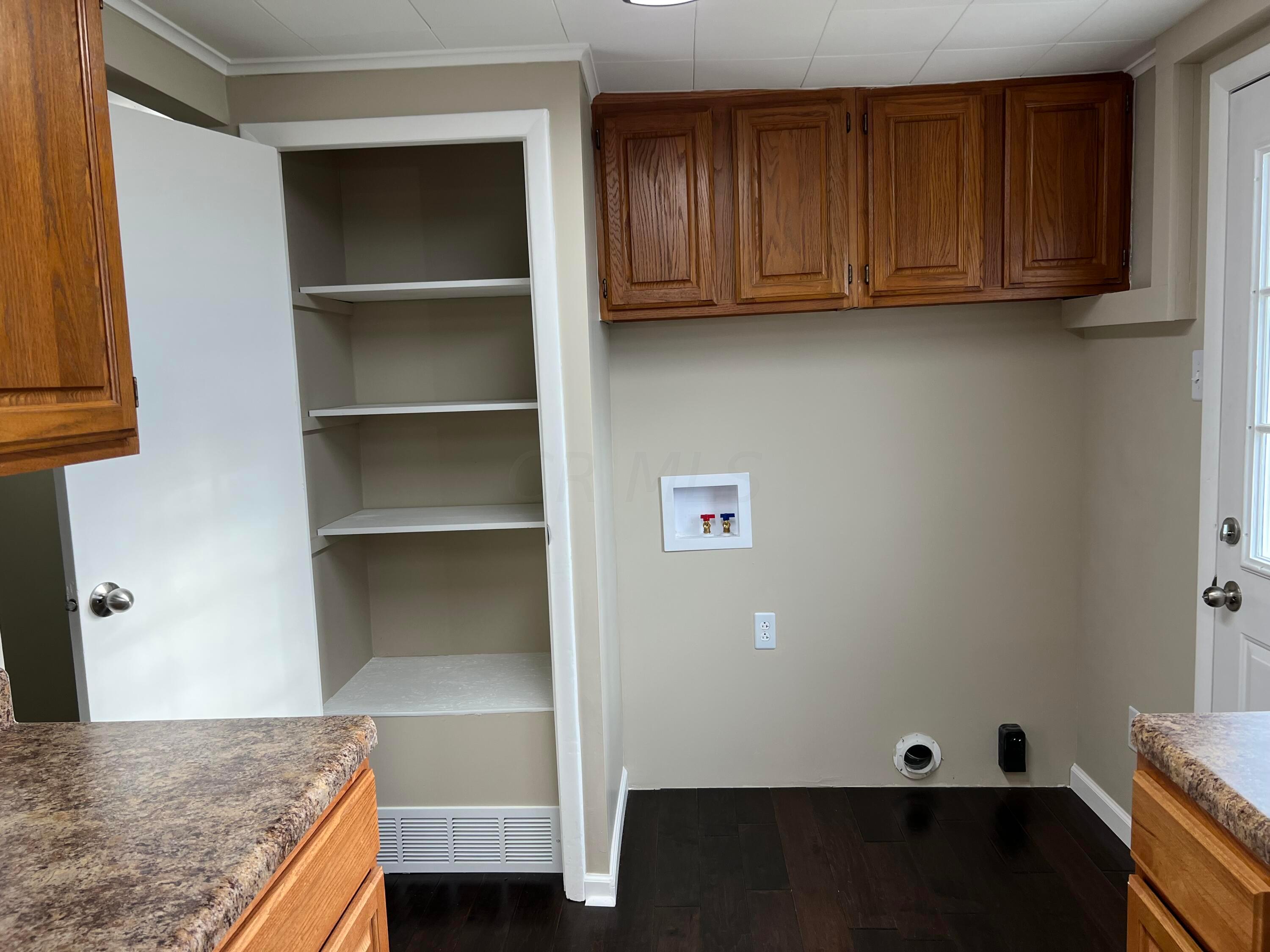 22555 State Rte 207 New Holland, OH 43145 - Photo 18 of 35 Laundry/pantry in kitchen