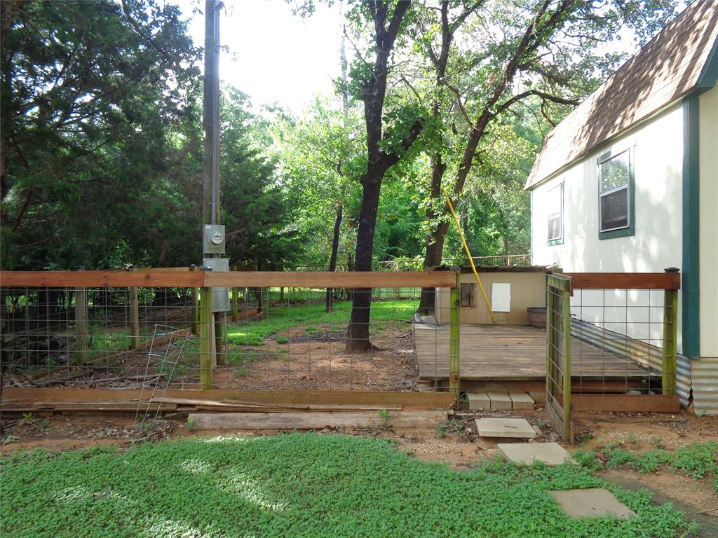 5525 Cedar Oaks Road Grandview, TX 76050 - Photo 25 of 40 Deck attached to workshop