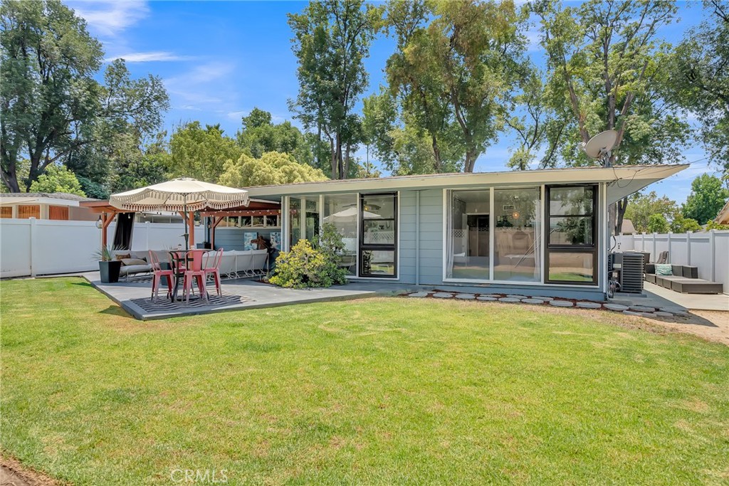 4231 Maplewood Place Riverside, CA 92506 - Photo 25 of 33 a view of a swimming pool with chairs
