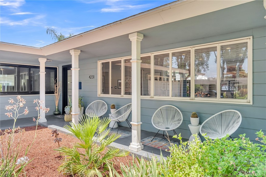 4231 Maplewood Place Riverside, CA 92506 - Photo 29 of 33 a front view of a house with outdoor seating
