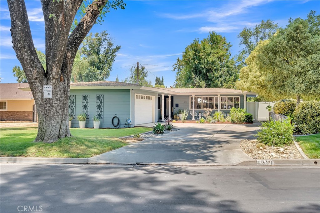 4231 Maplewood Place Riverside, CA 92506 - Photo 32 of 33 front view of a house with a yard
