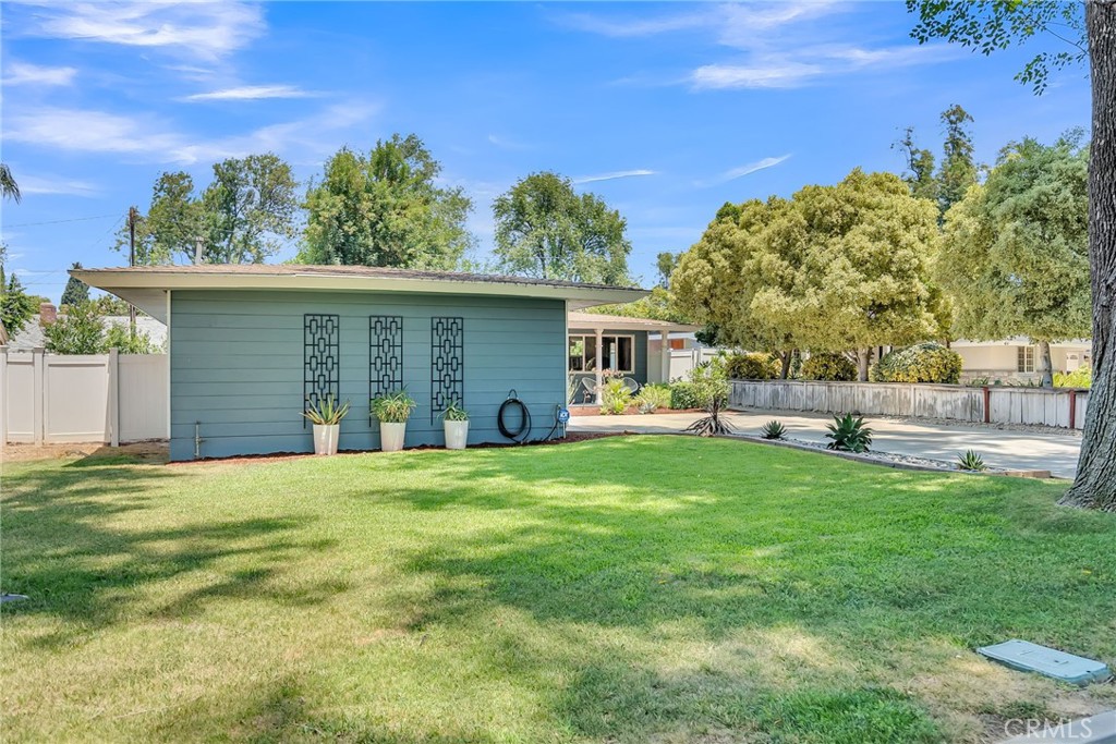4231 Maplewood Place Riverside, CA 92506 - Photo 33 of 33 a front view of a house with garden