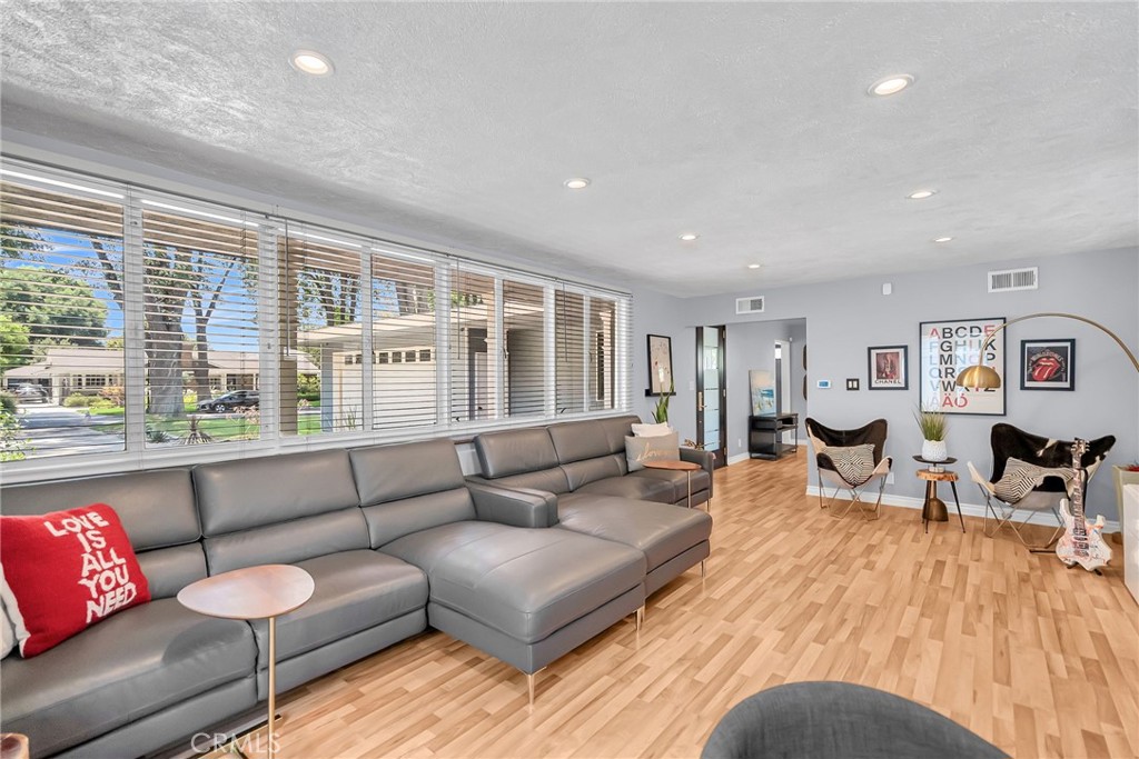 4231 Maplewood Place Riverside, CA 92506 - Photo 4 of 33 a living room with furniture and a large window