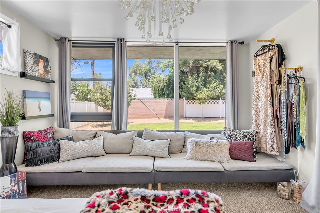 4231 Maplewood Place Riverside, CA 92506 - Photo 10 of 33 a living room with furniture and a large window