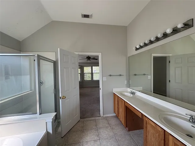 a room with a table and chairs