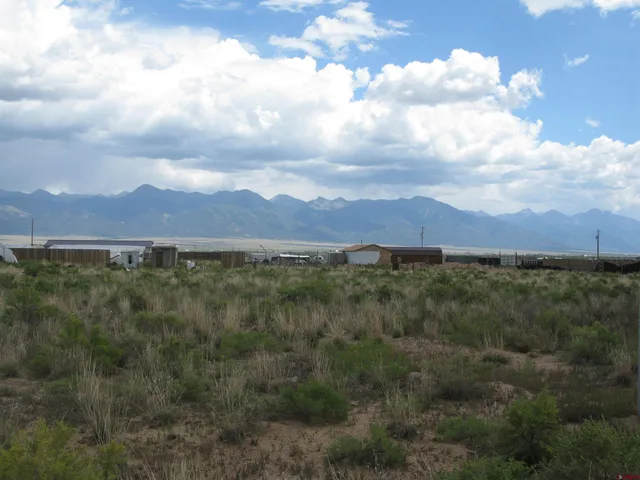 a fire hydrant in the middle of a field