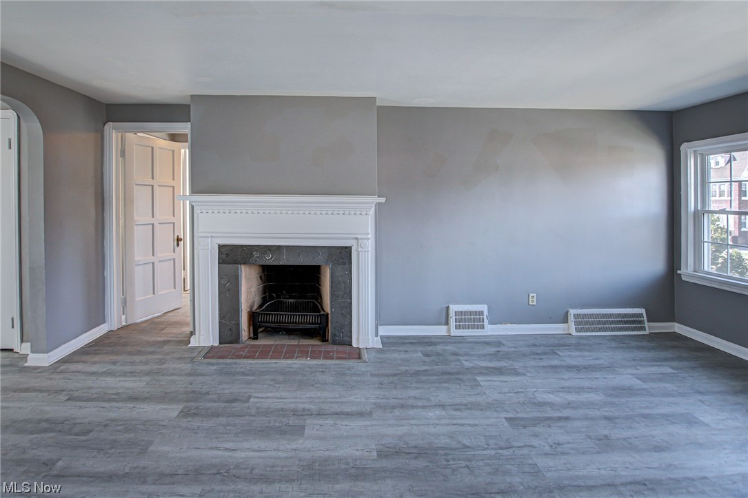 3423 Westbury Road Cleveland, OH 44120 - Photo 26 of 38 Unfurnished living room with dark hardwood / wood-style floors