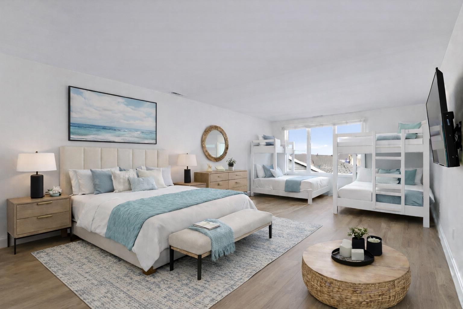 100 96th Street, Unit 304 Stone Harbor, NJ 08247 - Photo 2 of 34 a bedroom with bed couch and a window