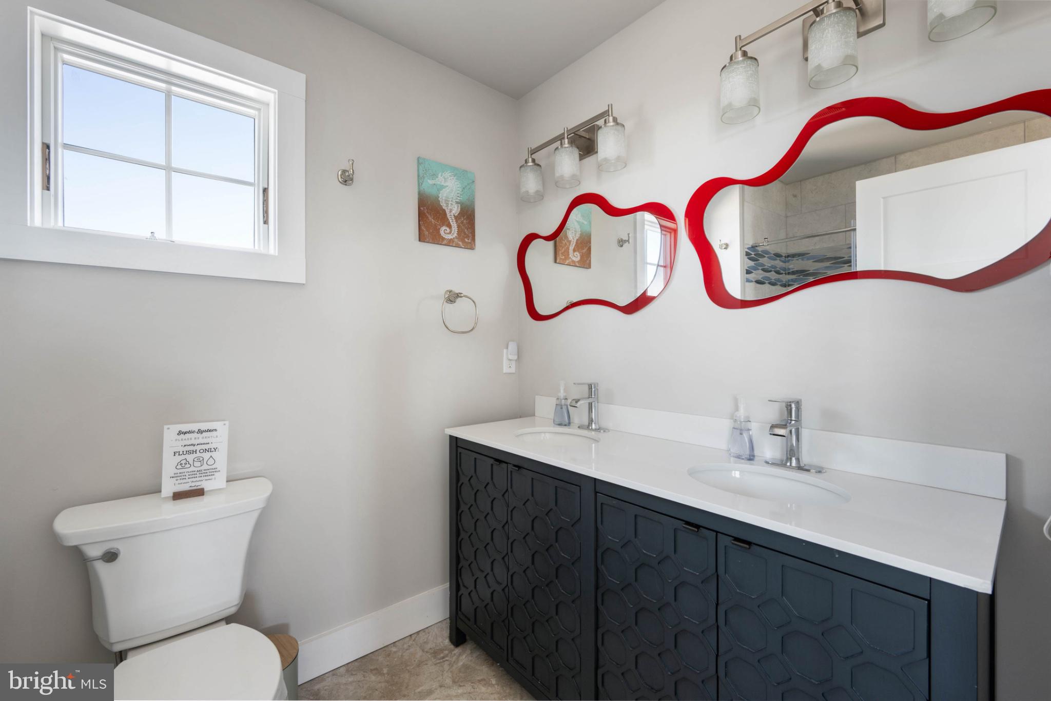 402 Bay Front Road Milton, DE 19968 - Photo 31 of 50 Chic bathroom with bold accents.